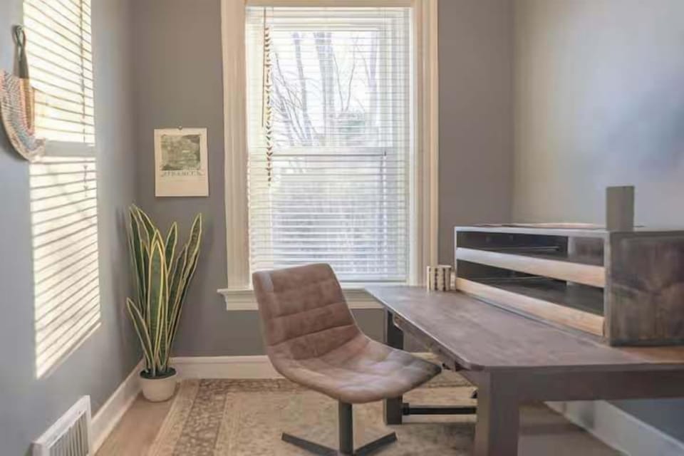 The private sun-filled office.