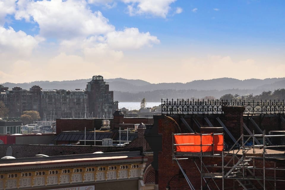 Enjoy the Peek-A-Boo Views of the Famous Inner Harbour / Ocean Views from your private roof top patio! 