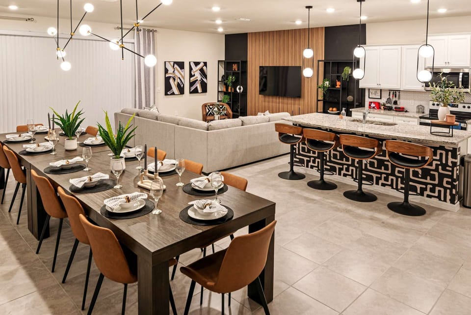 Experience luxury in this spacious open-plan dining and living area, perfect for gatherings and relaxation.