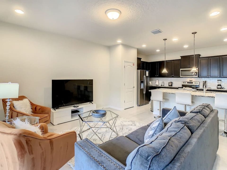 Cozy living room with a TV—perfect for a fun movie marathon with family or friends