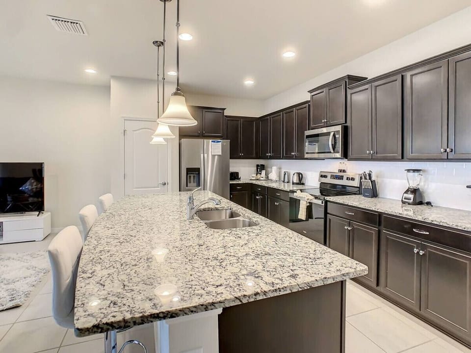A gourmet kitchen complete with cookware perfect for creating memorable meals with ease.