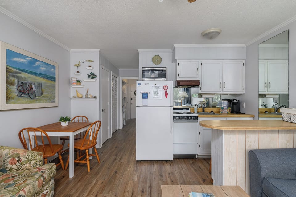 Breakfast table and good size fridge