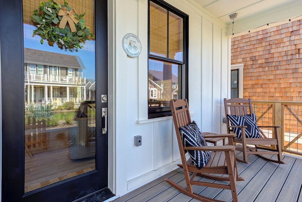Enjoy morning coffee and watch the kids play out front!