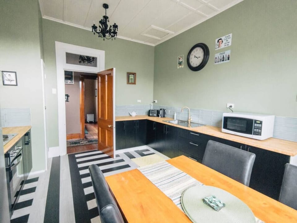 Simple well-appointed Kitchen-Dining (with adjoining laundry room).