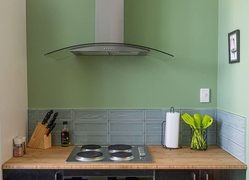 Simple well-appointed Kitchen-Dining (with adjoining laundry room).
