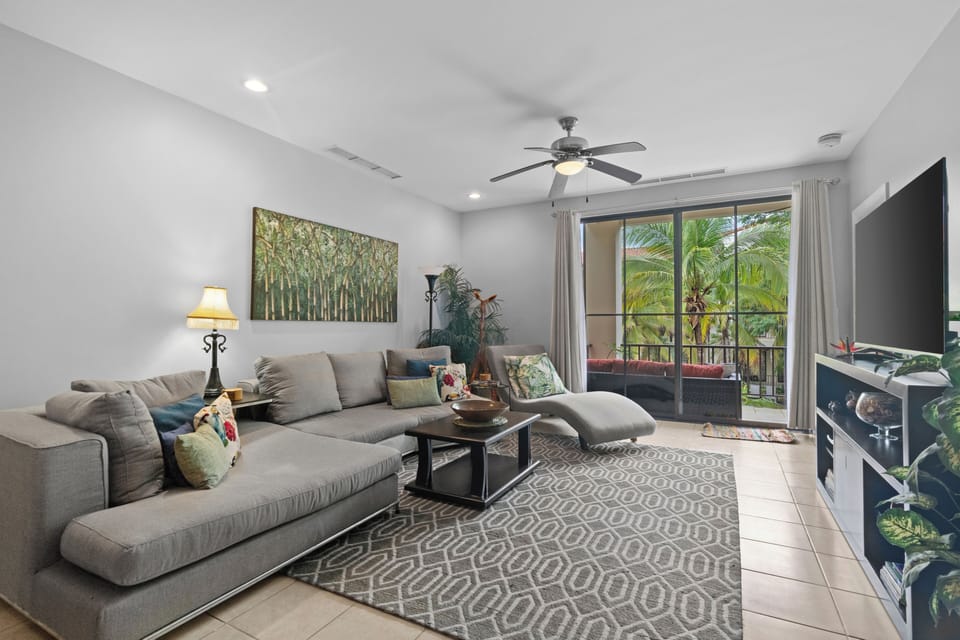 The living room offers ample space for relaxation.  Stream your favorite movies and shows on the Smart TV.