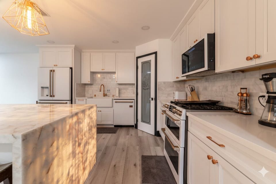 The chef’s kitchen has it all double oven, wine fridge, microwave, toaster, and a full array of appliances and kitchen tools to make cooking a breeze! We also have a coffee bar :)