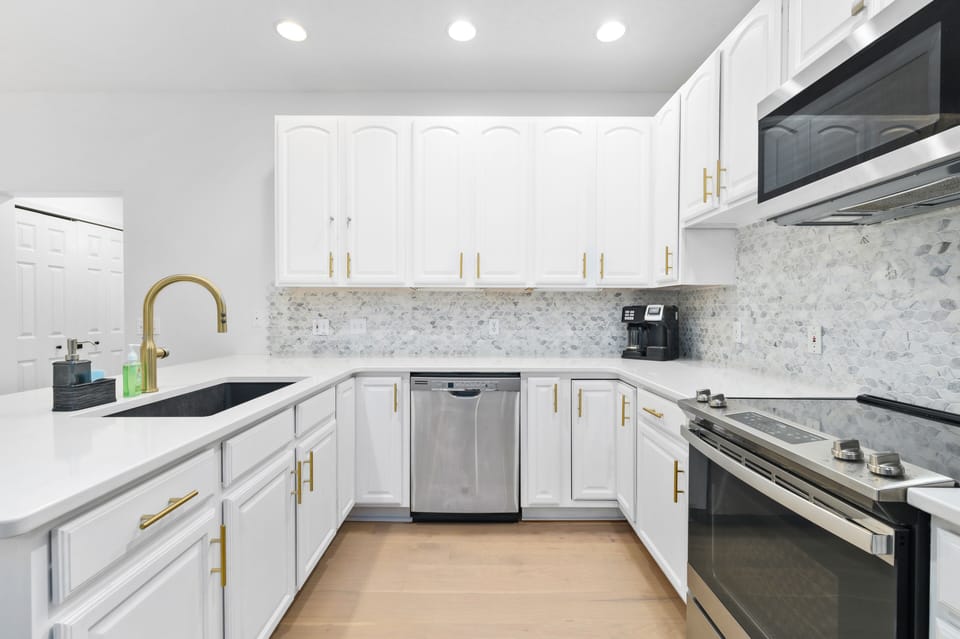 Fully equipped kitchen with stainless appliances