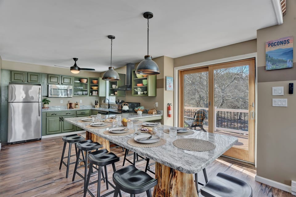 Nicely appointed kitchen island with seating for +10 guests and everything you need for a homemade meal.