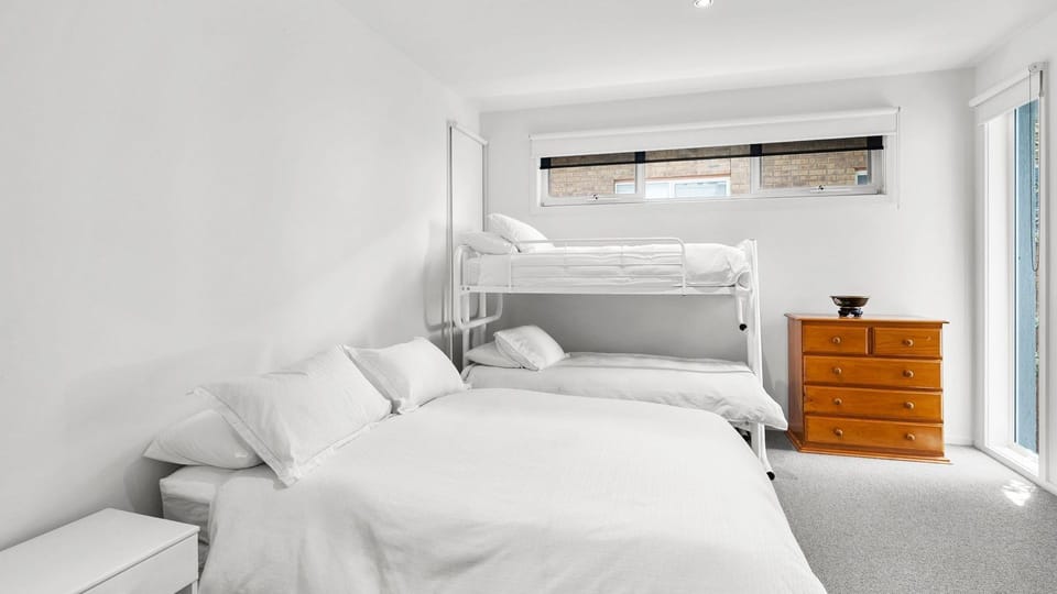Bedroom 4: Double and bunk beds with built-in robe