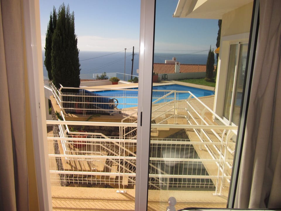 Sea and pool views from 2nd bedroom