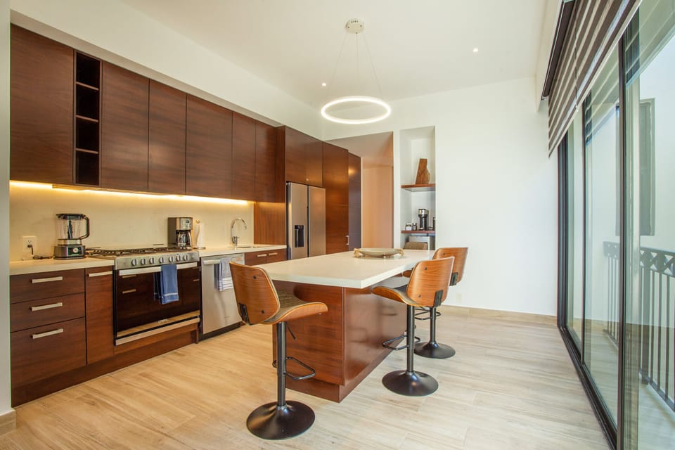 The kitchen has upgraded stainless steel appliances