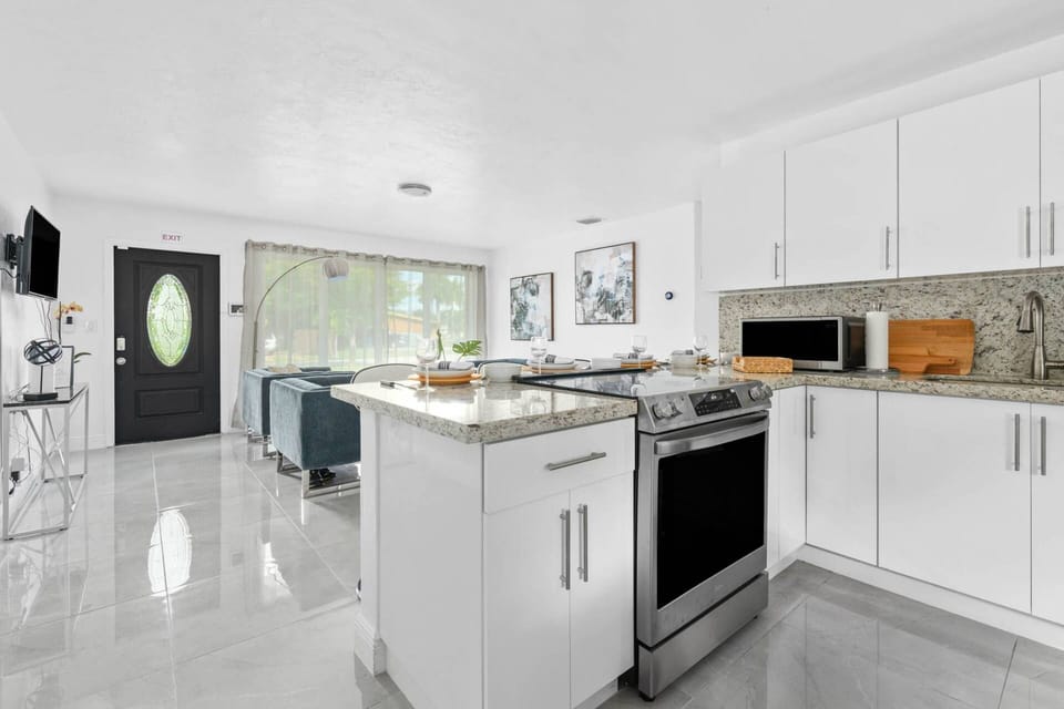 In the top left drawer you will find cooking utensils, underneath pots and pans, and to the right of the stove, bakeware, and kitchen appliances are t