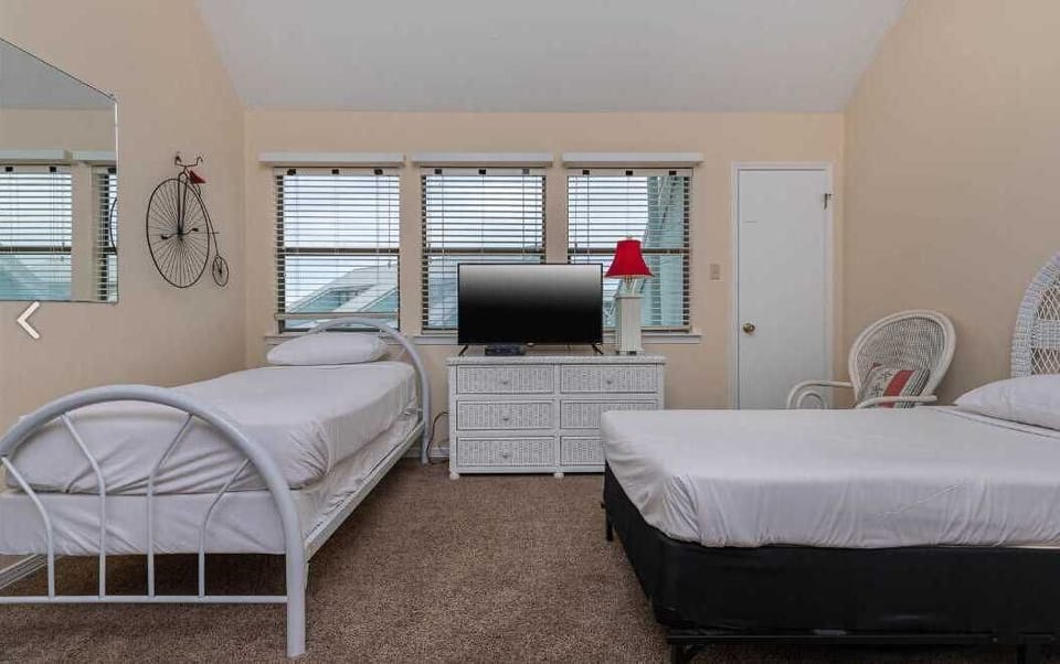 The third bedroom loft area with Flatscreen TV.