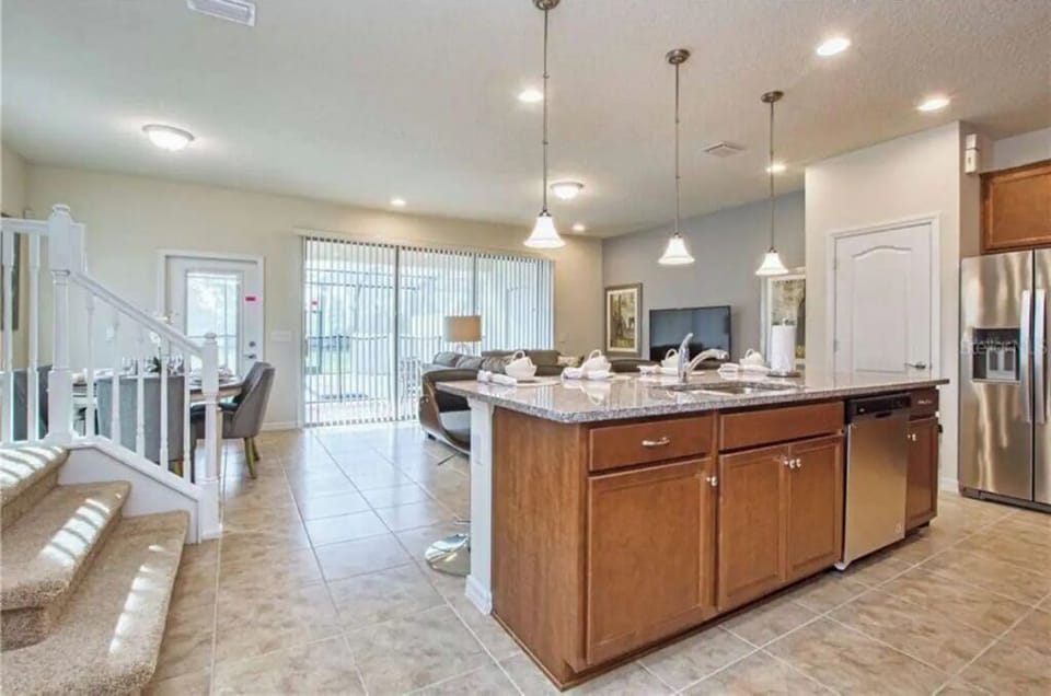 Open space concept with stainless steel appliances
