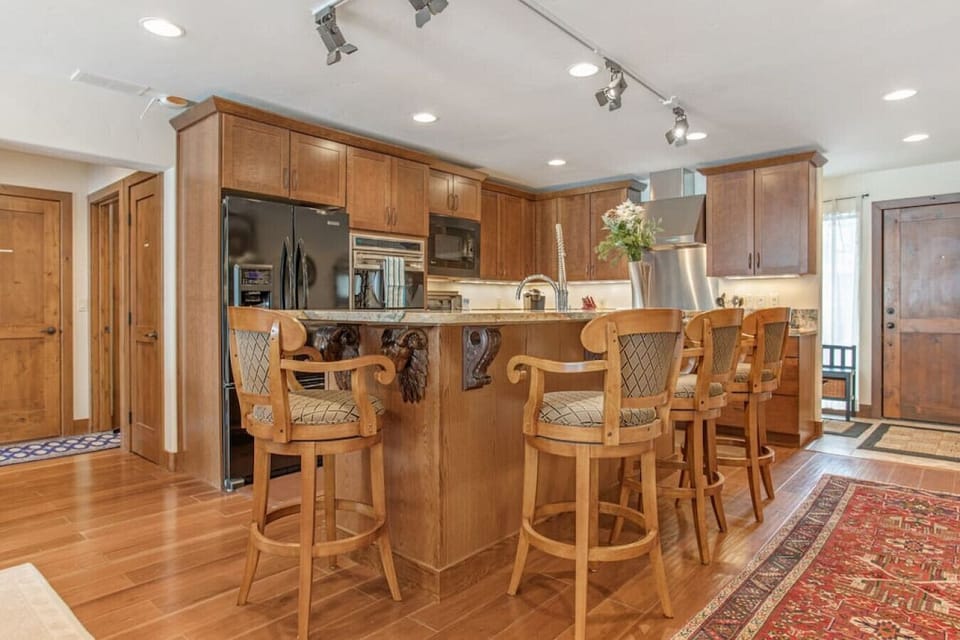 Enjoy coffee together at the kitchen island together before heading out to start your day