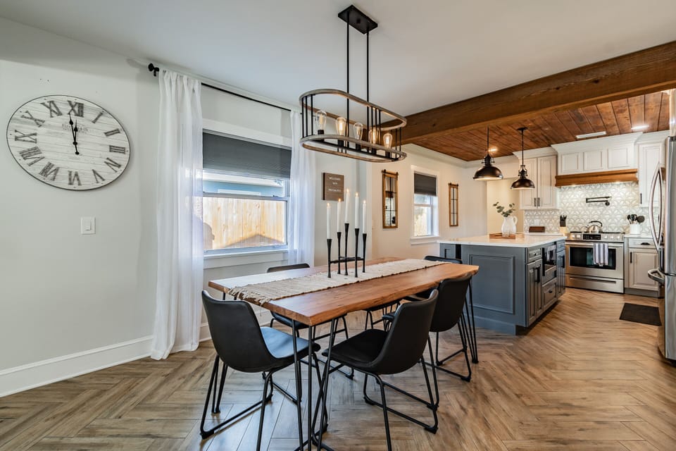 Dining room table seats six plus two more at the island. plenty of room. Enjoy!