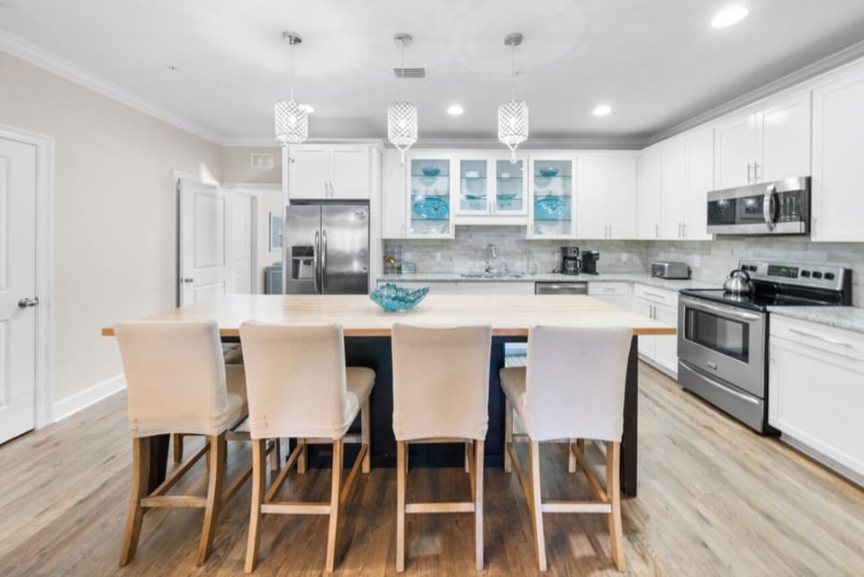 2nd Floor - 🍽️ Dining Area for 8, fully equipped kitchen with granite countertops and stainless-steel appliances