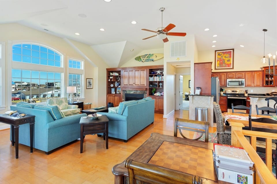 The spacious Living Area boasts lots of natural light and a large flat-screen TV!
