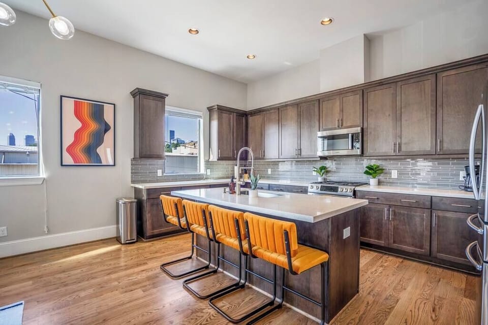Large kitchen and island. Fully stocked kitchen.