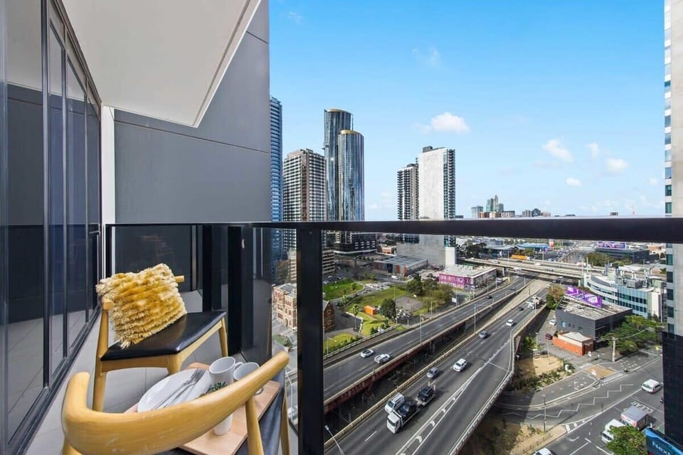 A balcony with city views. *Chairs on balcony from dining area.