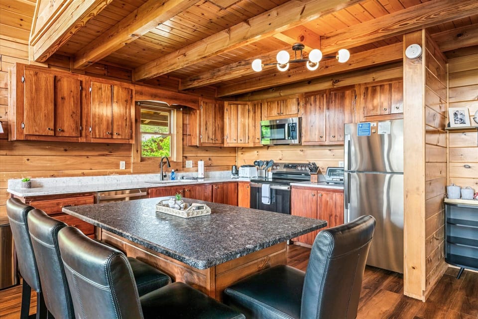 A kitchen built for a crowd — full appliances and space for more than one cook.