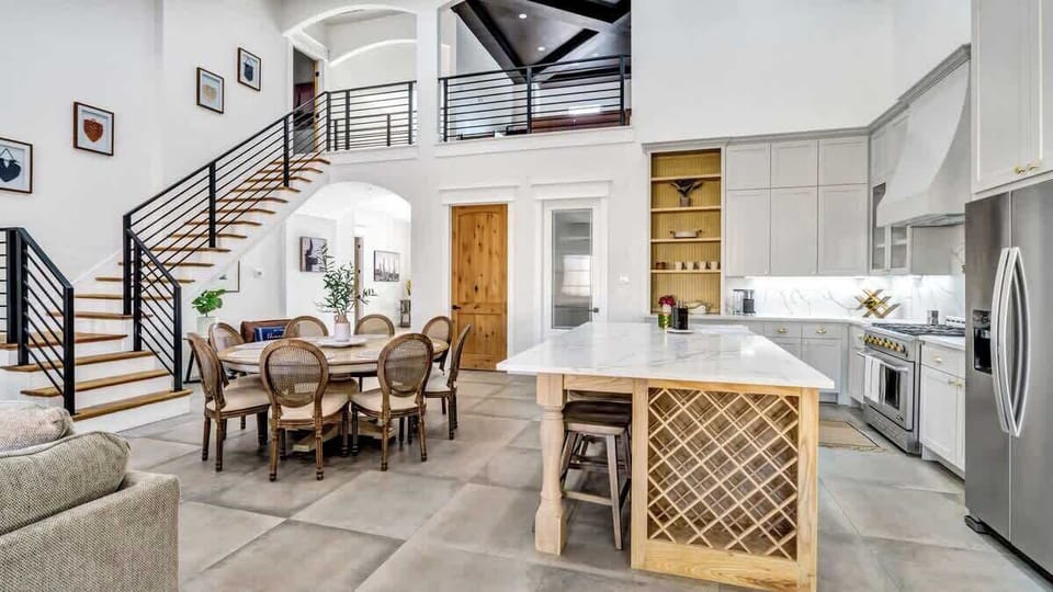 Gather, dine, & make memories in this inviting space. Enjoy morning coffee at the island, family meals at the dining table, and laughter-filled evenings that flow effortlessly from kitchen to living area. A perfect setting for connection & comfort!