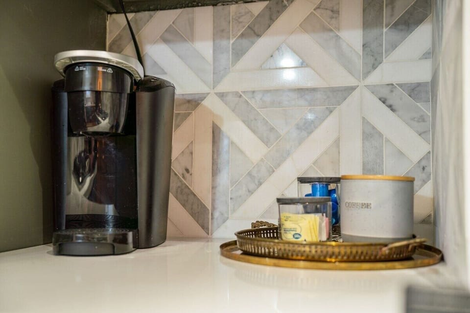 Our coffee station includes a full-size Keurig machine, drip coffee maker,  K-cups, various sweeteners and french vanilla creamer.