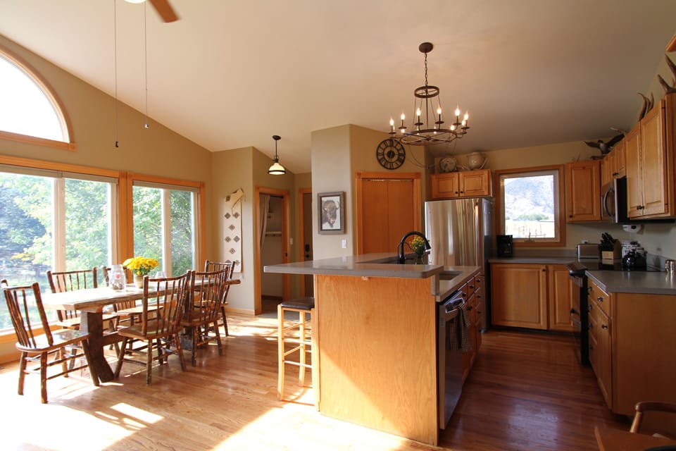 Fully stocked kitchen with pantry and dishwasher.
