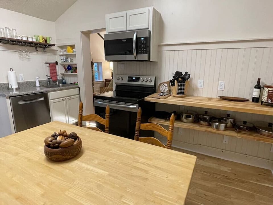 The kitchen is in the center of the cabin with everything you need to cook.