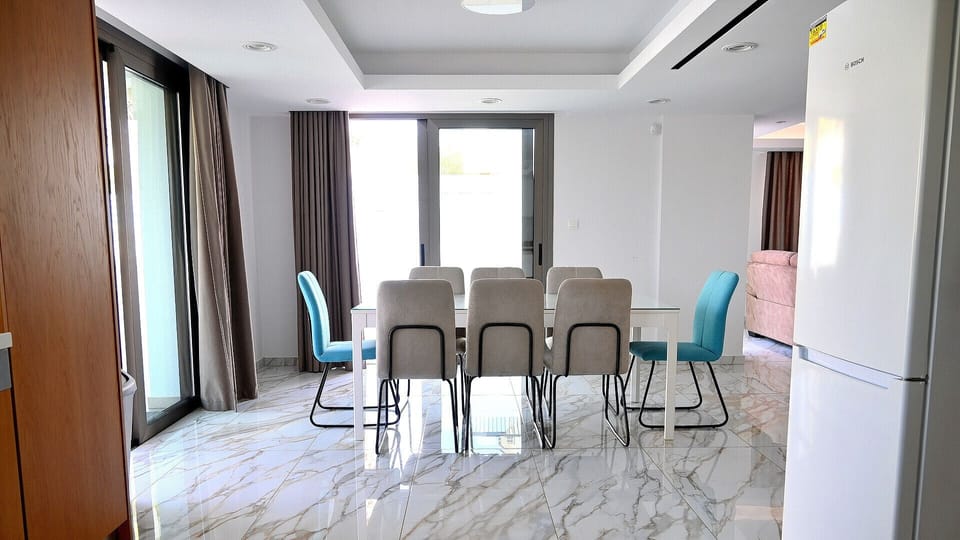 Ground floor is open plan and hosts up to 8 guests in luxury.