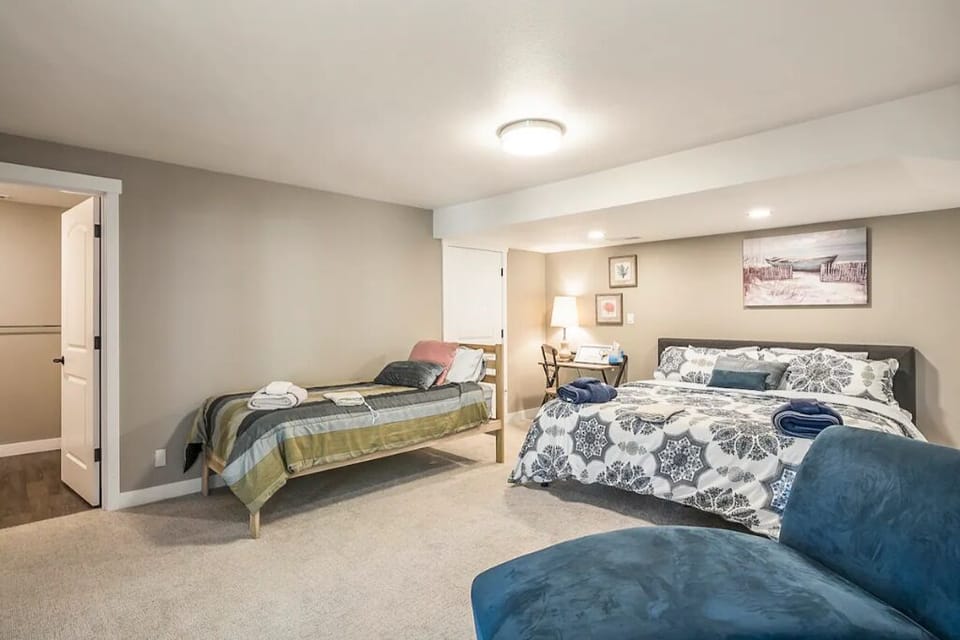 Downstairs bedroom #5 w/ king bed and single bed