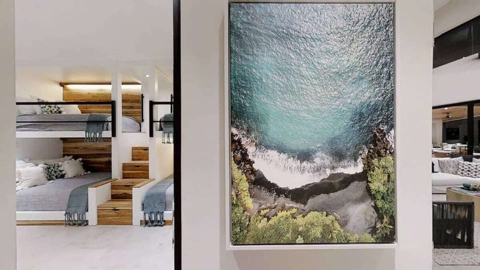 Beah Art lines the walls  throughout the home