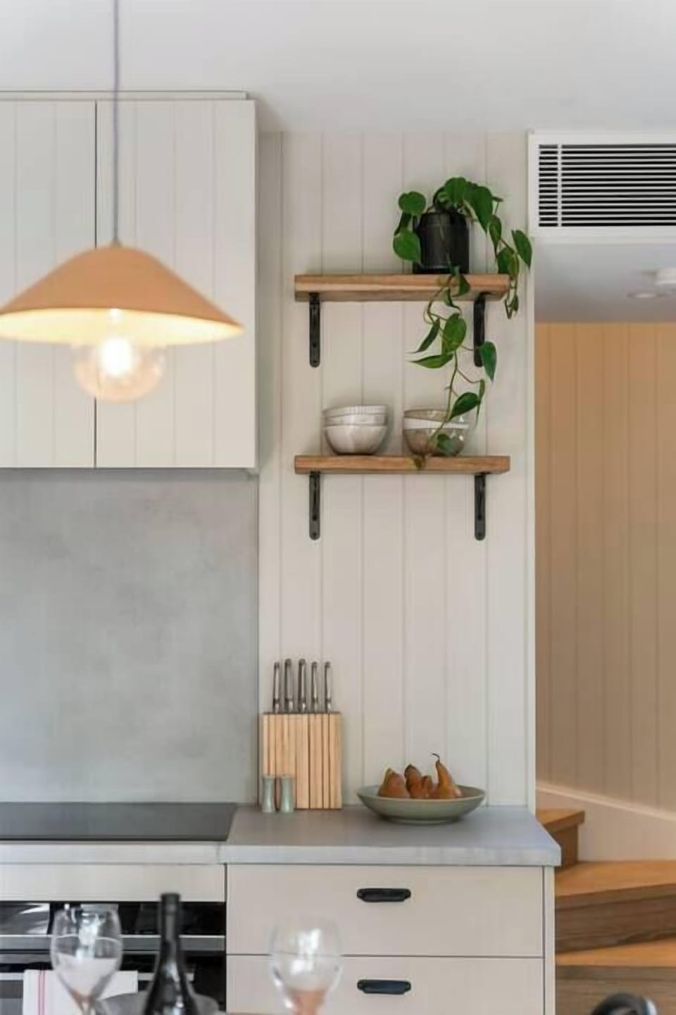 Kitchen with fridge, freezer, coffee pod machine, toaster, kettle, microwave, stove top and oven. All cookware and utensils provided.