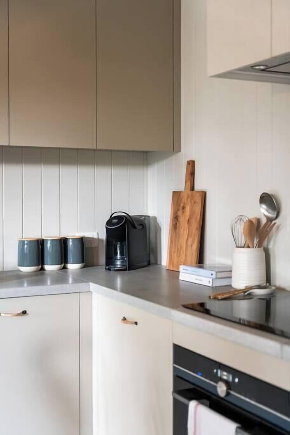 Kitchen with fridge, freezer, coffee pod machine, toaster, kettle, microwave, stove top and oven. All cookware and utensils provided.