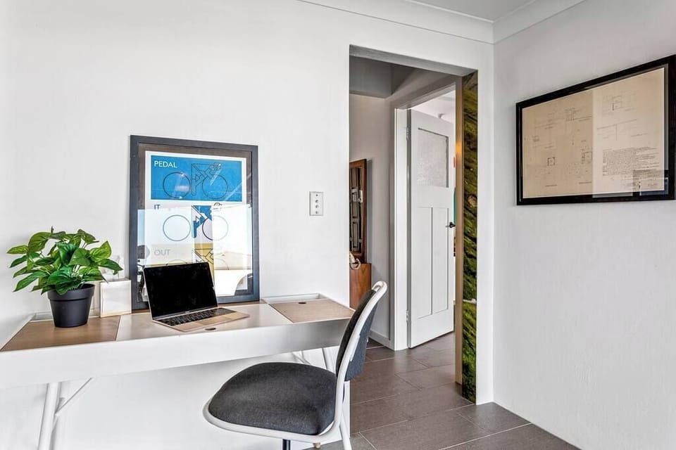 Ground level study nook with direct access to the pool and undercover deck area. A perfect oasis to relax after a hard days work. A bedroom and separate bathroom are also on this level.  
