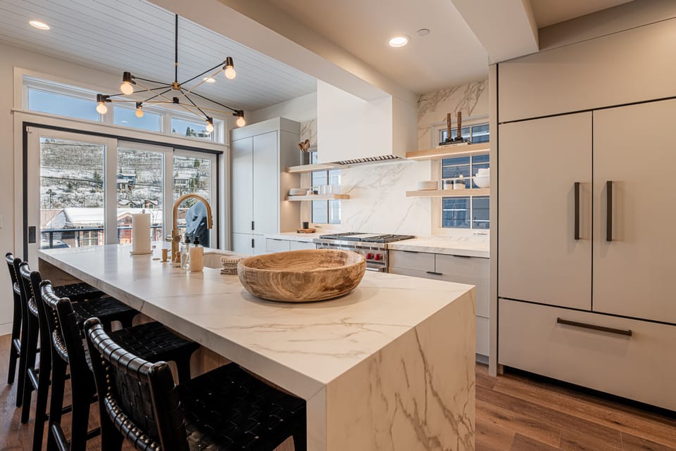 Fully equipped gourmet kitchen featuring and spacious island with seating for four