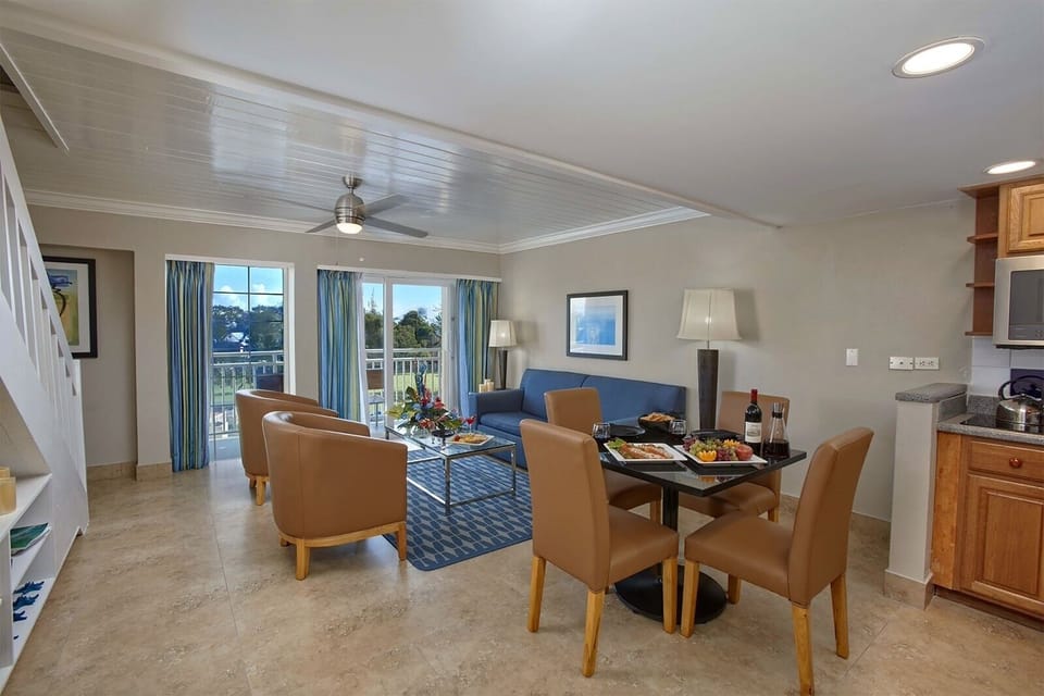 Share a leisurely dinner in the bright open-plan space.