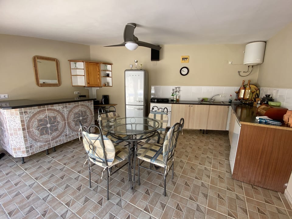 Outdoor summer kitchen with Bar , kitchen , Drinks Fridge, Music system & Darts 