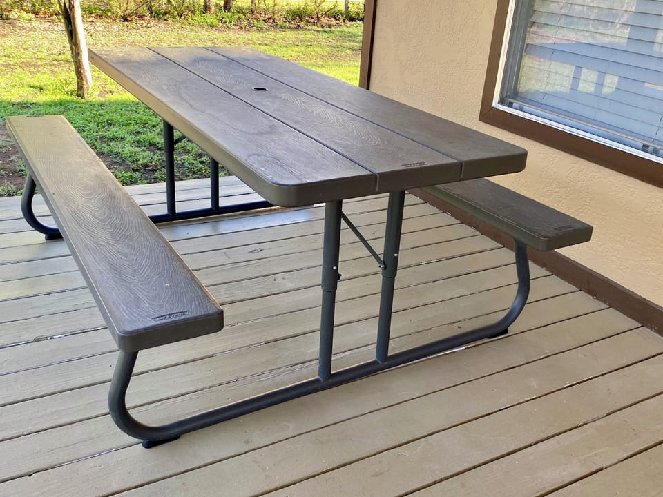 Deep Waters - Front porch dining table.