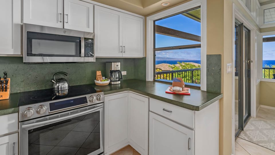 Kapalua Ridge Villas #1112 - Kitchen & Lanai Ocean View - Parrish Maui