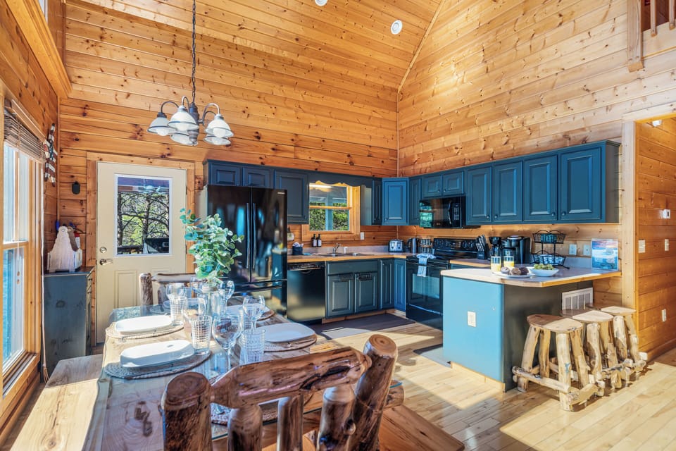 Dining table that sits 8 people. Plus there are 3 stools by the kitchen island.