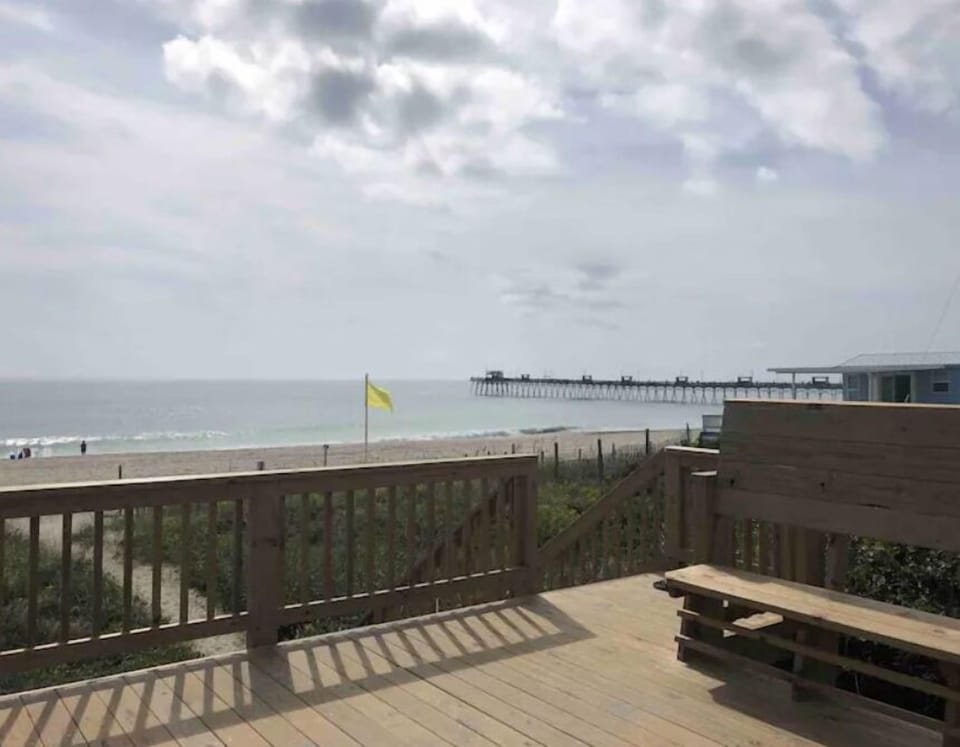 Deck with beach access for private parking area