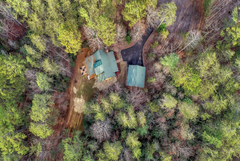 Close-up aerial view of the cabin.