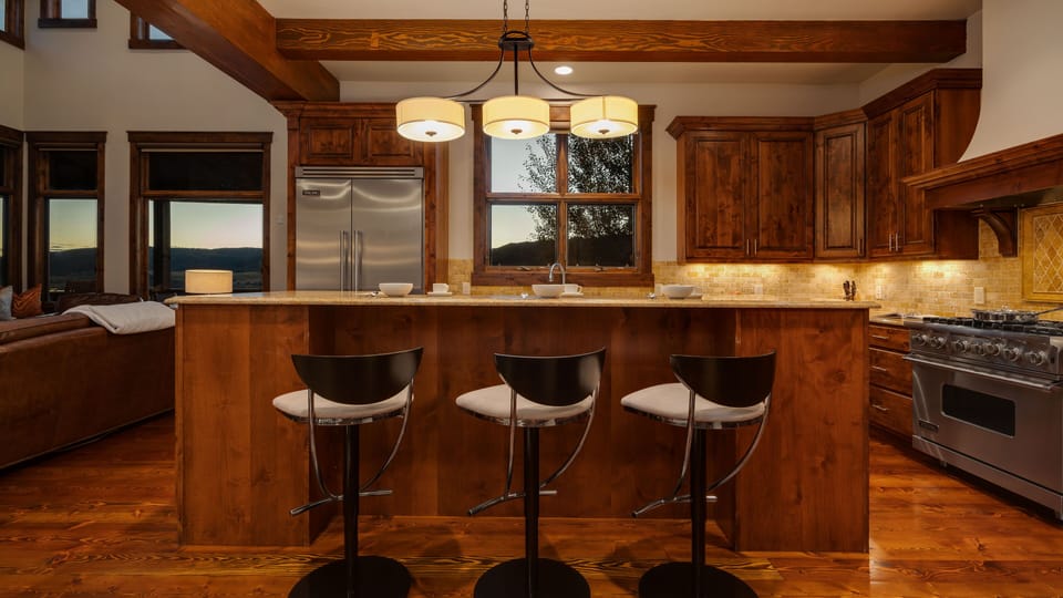 Gourmet kitchen with breakfast bar seating