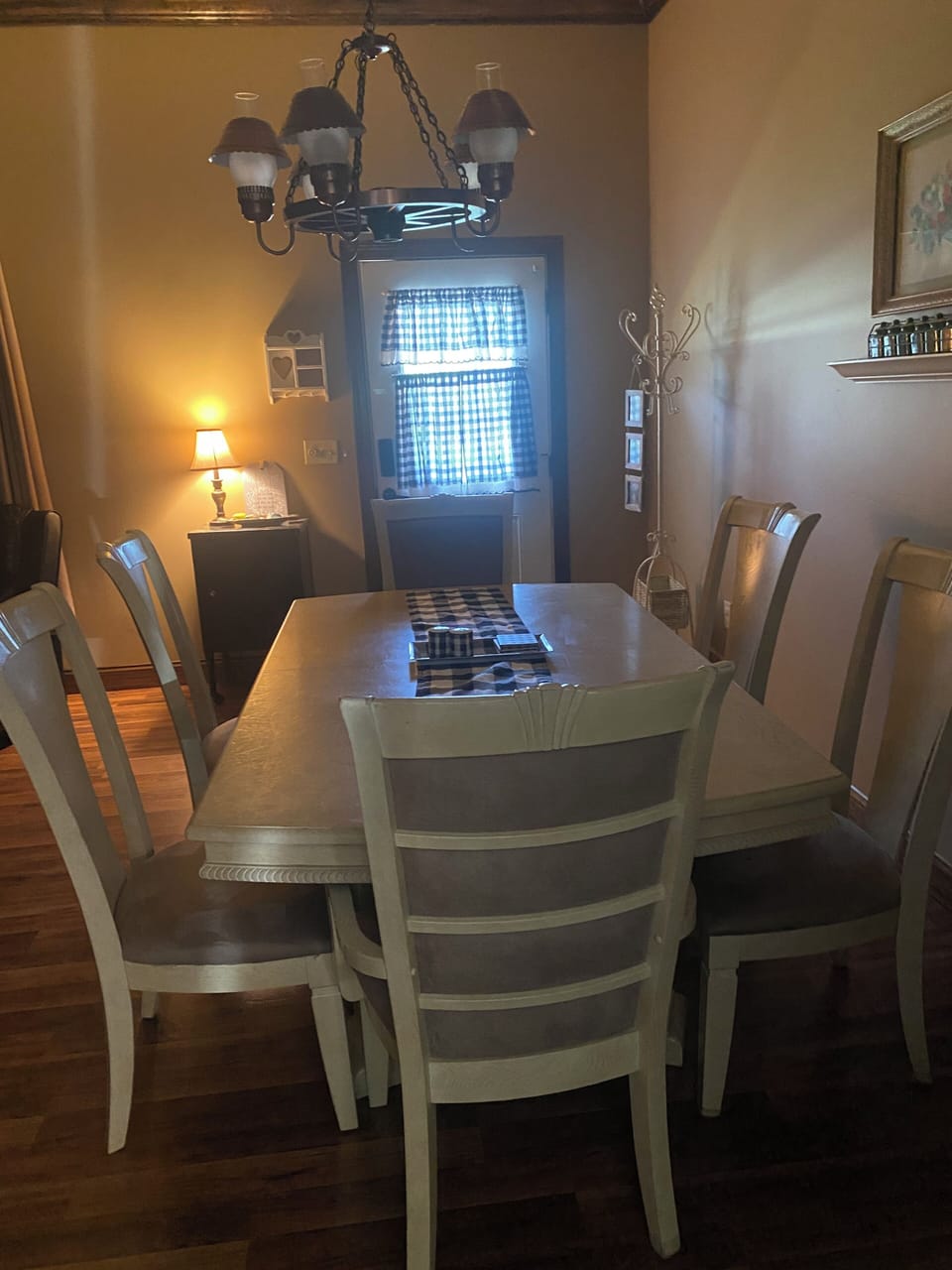 Open concept living room dining room. Table with 6 chairs
