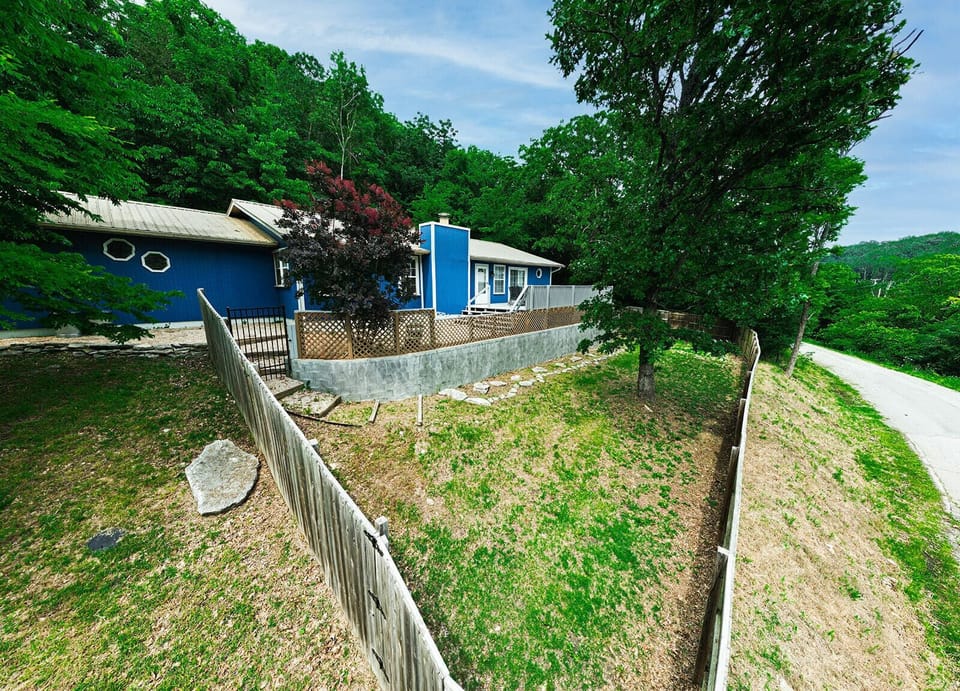 Very Private Setting on a quiet rural road near Beaver Lake Dam.