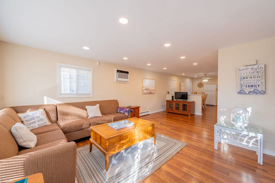 The view from the front door looking into the open living room to dining area.
