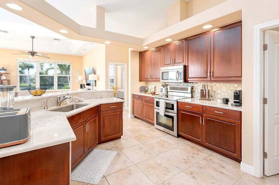 Kitchen Features Stainless Appliances, a Double Oven, Stove, Dishwasher and Fridge with Ice Maker