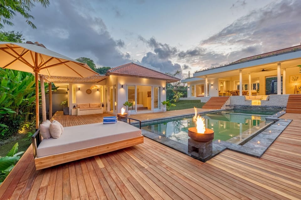 Fire pits at the end of the pool
